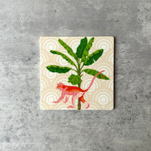 Load image into Gallery viewer, Biege, cream coaster with Monkey walking around a big tree