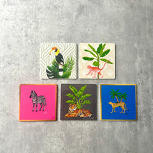 Load image into Gallery viewer, Animalia Coasters by Meraki Lily featuring zebra, tiger, toucan, monkey, and cheetah designs, perfect for mixing and matching on your table