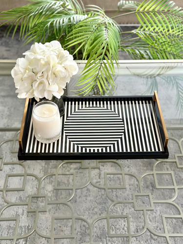 Black and white striped tray iwith gold handles, modern, stylish, contemporary and elegant