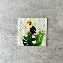 Load image into Gallery viewer, Geometric coaster with big toucan sitting on a branch


