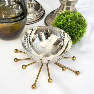 silver nut bowl with gold spikes, luxurious and modern 