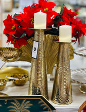 Load image into Gallery viewer, Decorative candle holders with red flowers and candles on a table.
