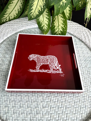 red maroon and white tray with white leopard cheetah, wild bold royal animal, Cartier deep red luxurious tray, fine details, rich looking