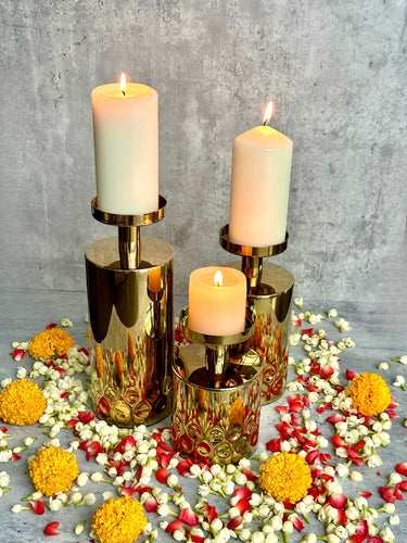gold pillar candle stand, luxurious and festive, modern and elegant
