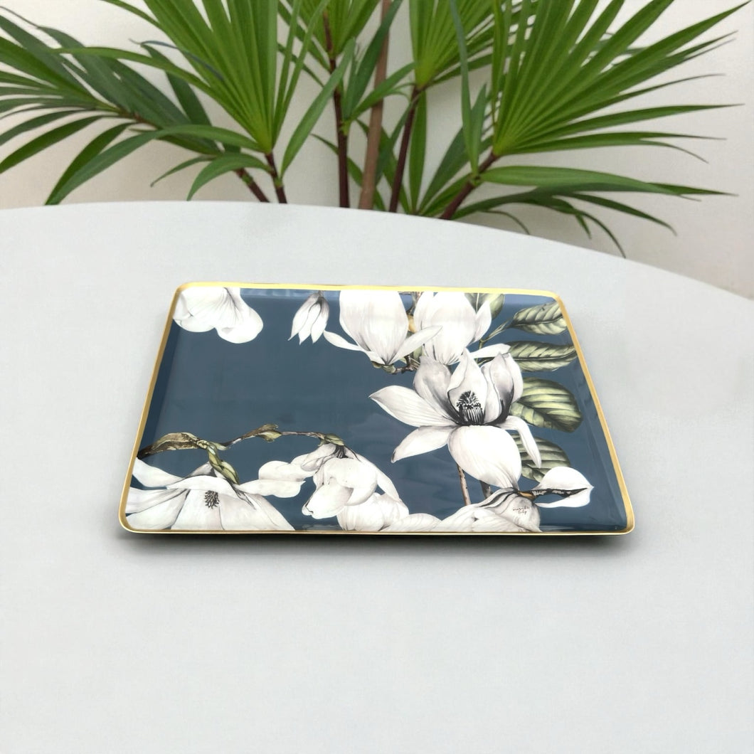 Cassina Tray featuring elegant white magnolias, perfect for serving or decorating your table.