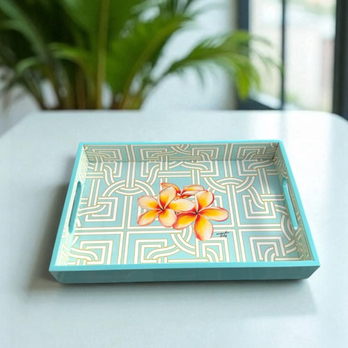 Frangina Tray with geometric and frangipani design, ideal for serving or decorative use.