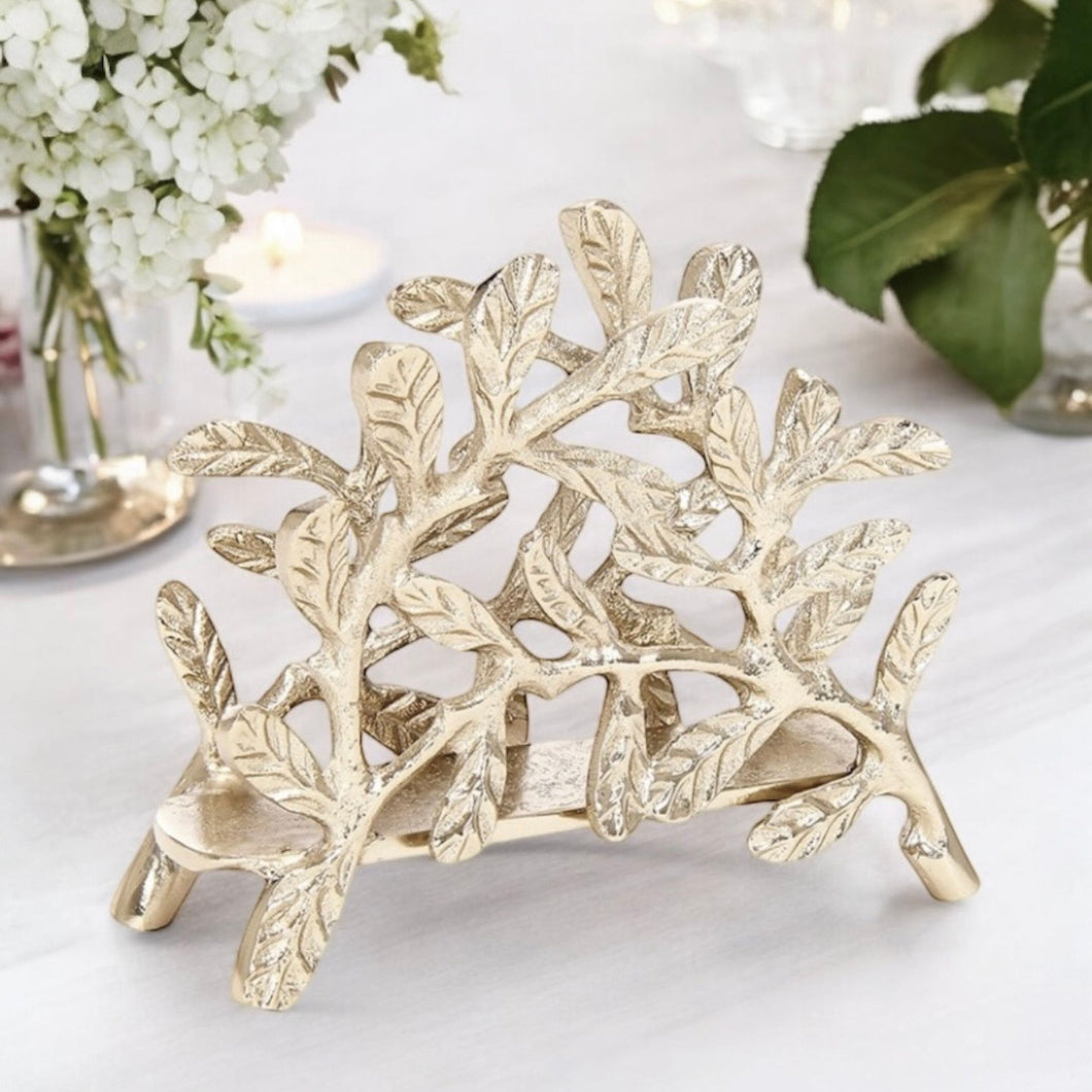 Pianta Napkin Holder in champagne gold by Meraki Lily, perfect for stylish and playful mealtime settings