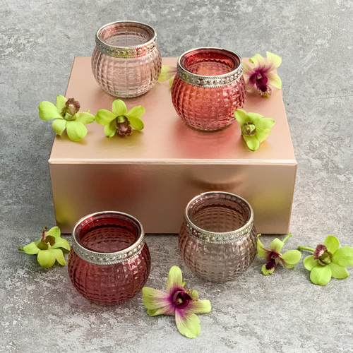 pink glass tea light with silver rim, festive and elegant