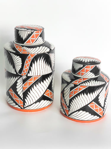 black and white with hint of orange ceramic decor jar