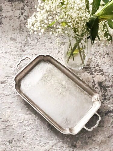 silver metal tray with handles, elegant and modern luxury